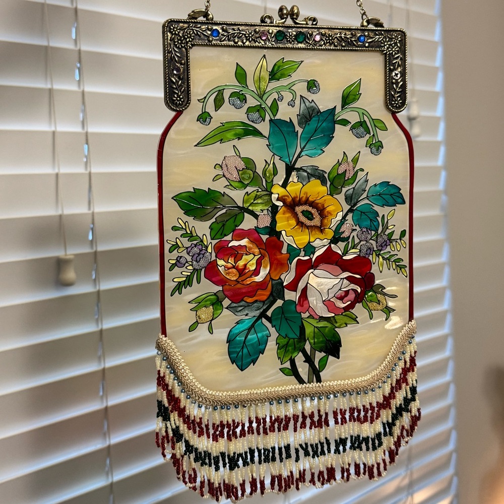 Amia purse shaped beaded suncatcher.